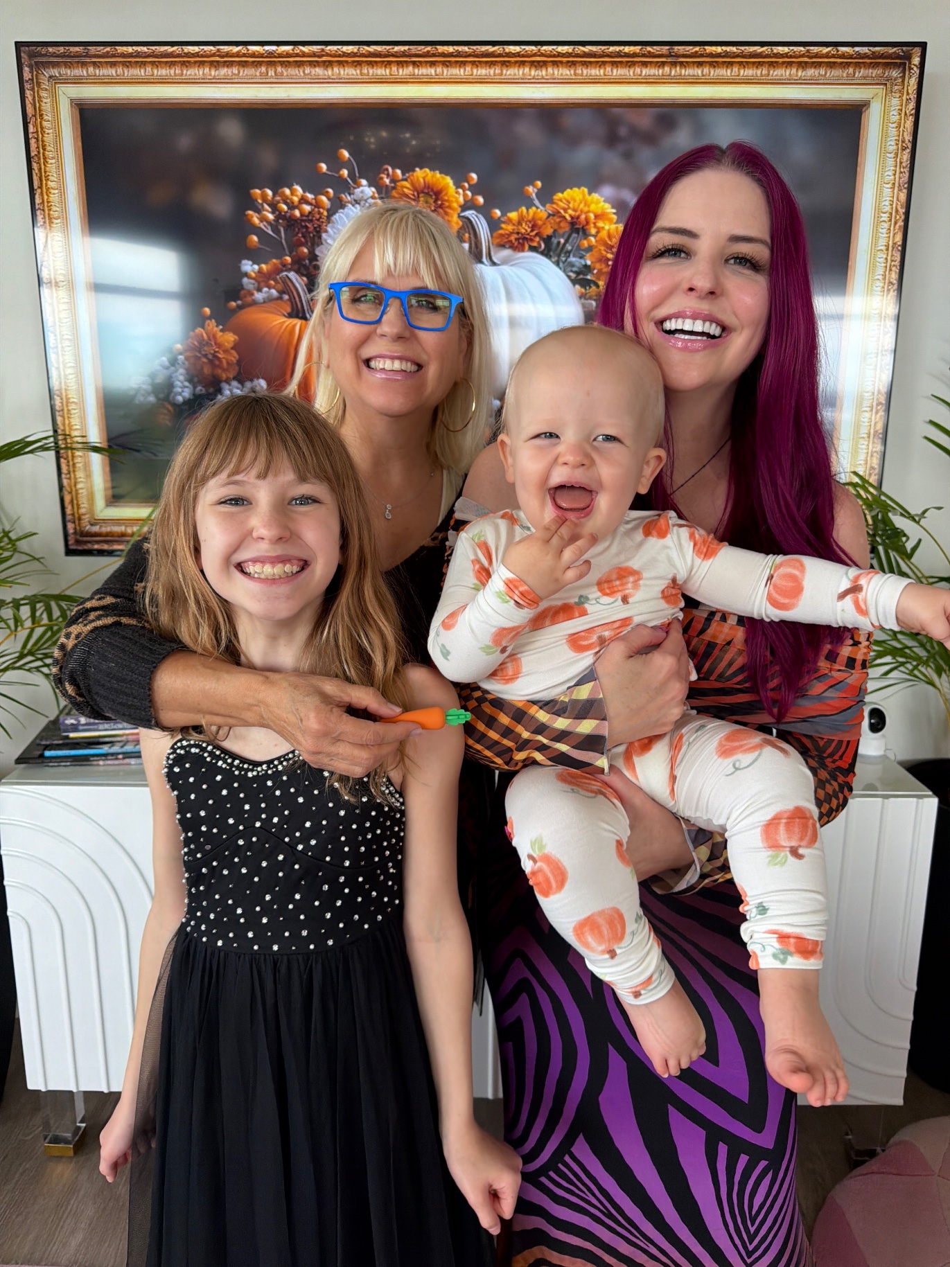 Family laughing together at Galloween: Ashley, Lily and baby London