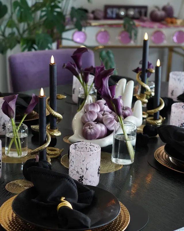 Galloween tablescape in lilac, purple, black and gold with the SPOOKY sign behind the table
